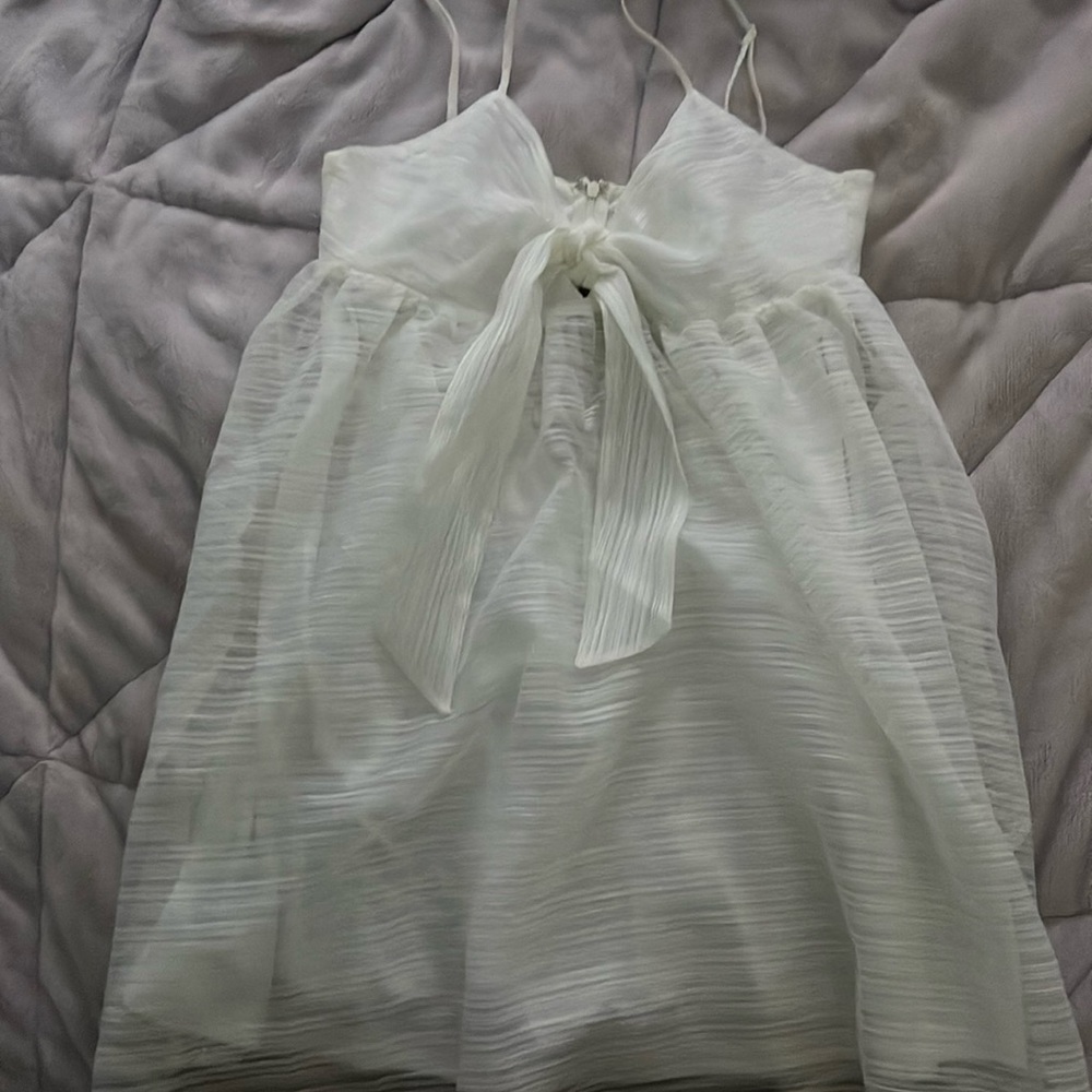 I bought this dress on a boutique, small, white.